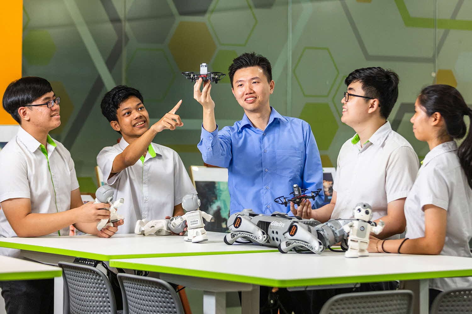 He teaches AI, assisted by AI